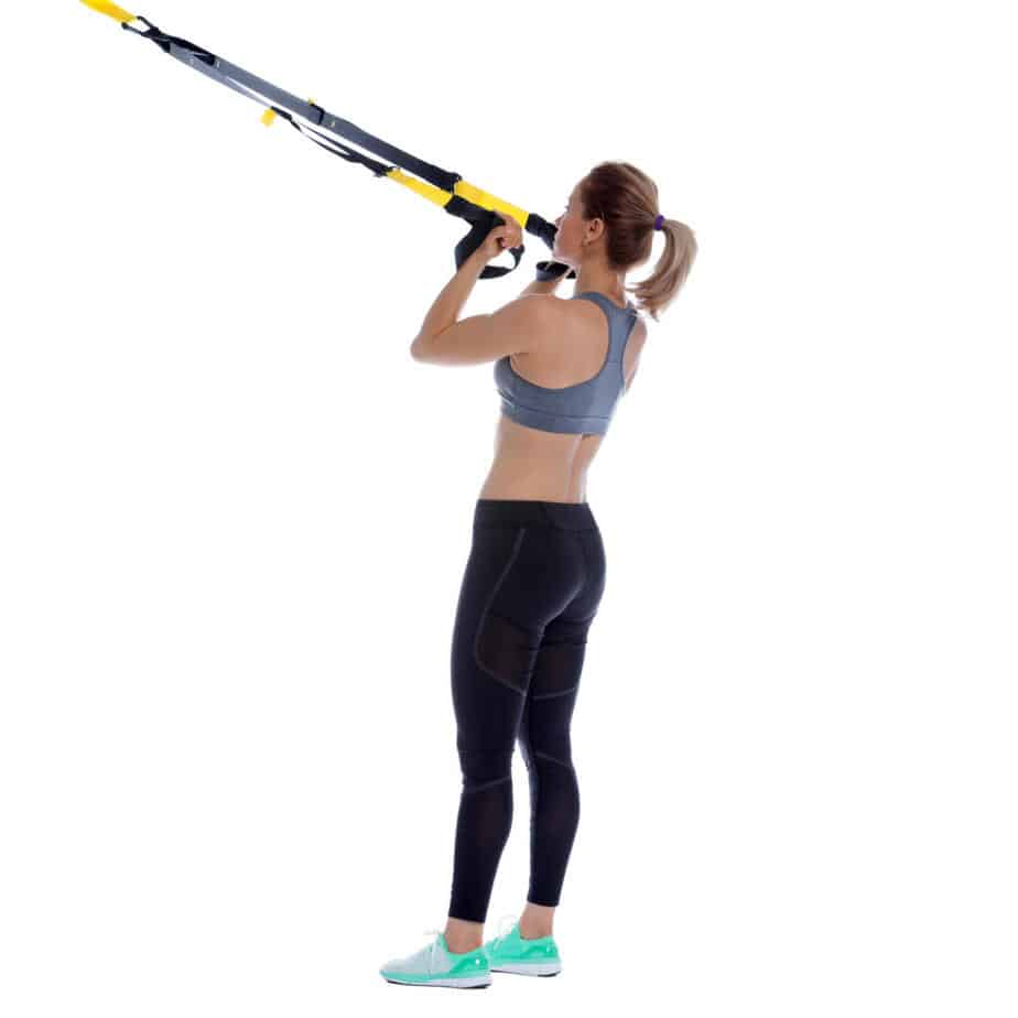 Girl performing TRX Biceps Curl