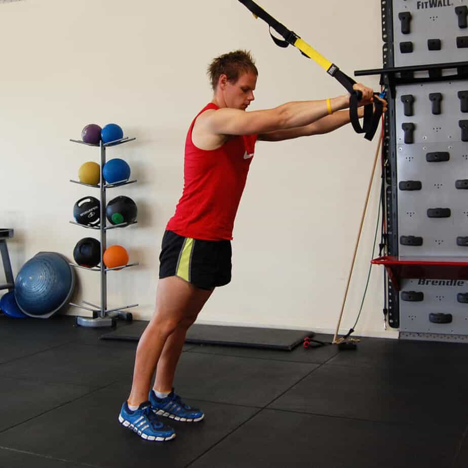 Man performing a TRX Triceps Extension