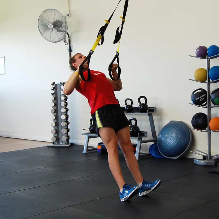 Man performing the TRX high row
