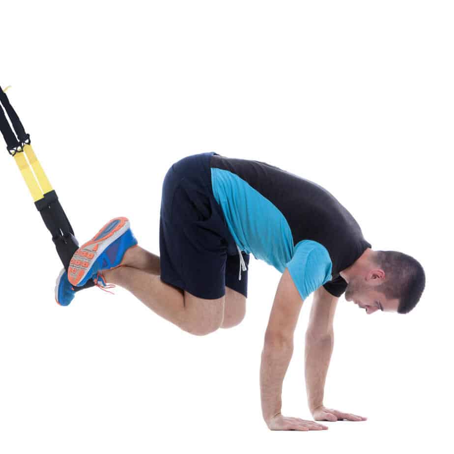 Man performing TRX-Jacknife