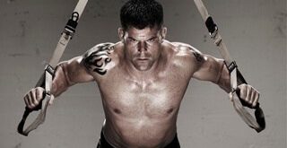 Man performing TRX Chest Press