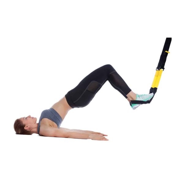 Girl performing a TRX Hamstring curl