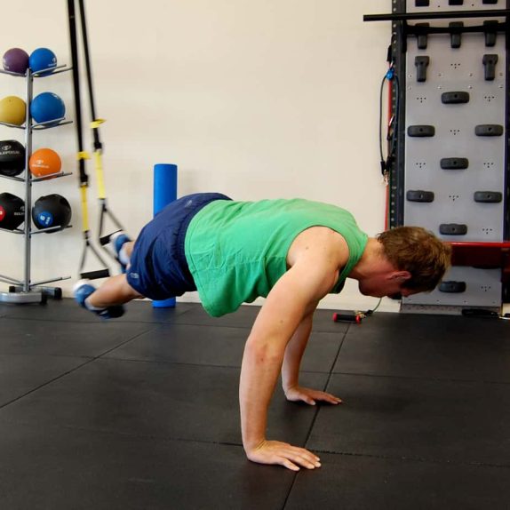 Man performing the TRX Pendulum