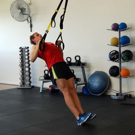 Man performing TRX Squat Row